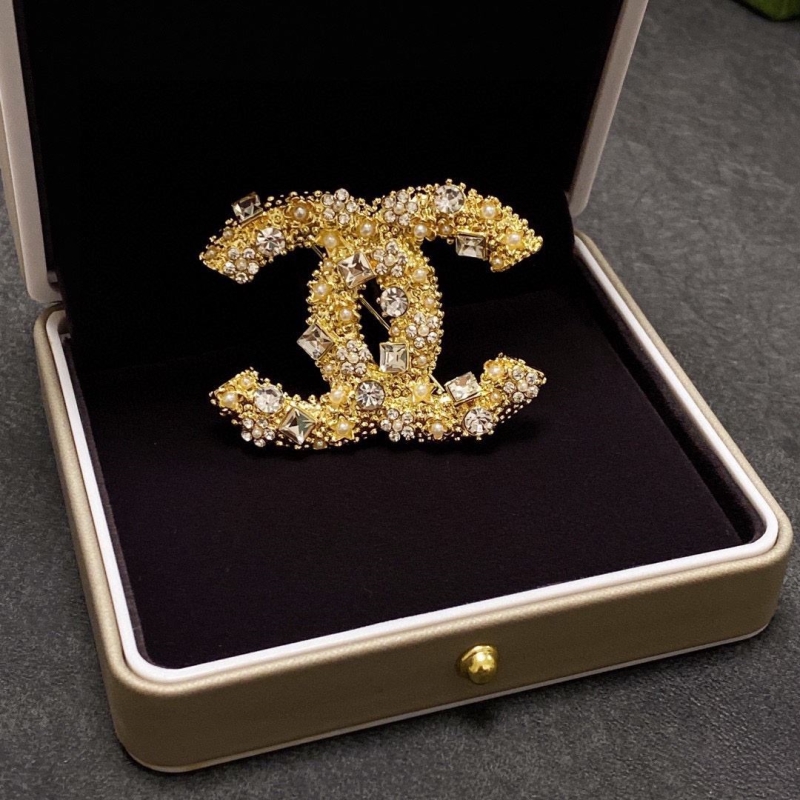 Ch**el brooches